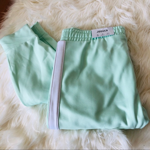 mint green jogging suit